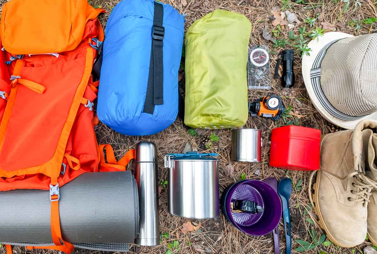 oxyfresh_dental-blog-post-Genius-Backpacking-Toothpaste-Hack-to-Try-Right-Now-flat-lay-of-backpacking-supplies