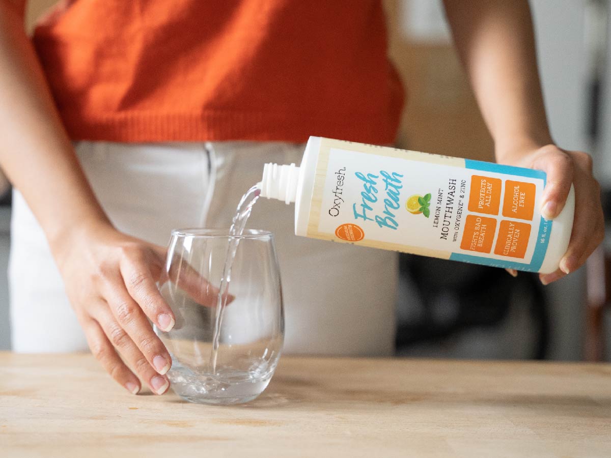 Oxyfresh-fresh-breath-lemon-mint-mouthwash_being-poured-into-glass