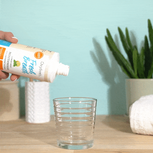 oxyfresh-lemon-mint-fresh-breath-mouthwash-pouring-into-glass